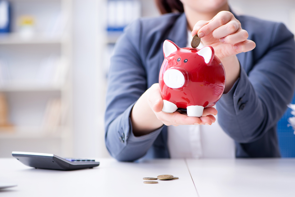 Businesswoman in pension savings concept